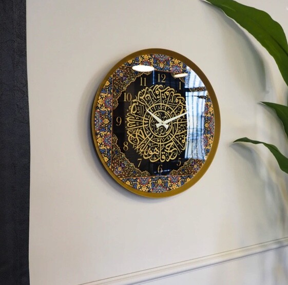 A colorful metal wall clock with Surat Al-Ikhlas written on it - covered with glass - 4