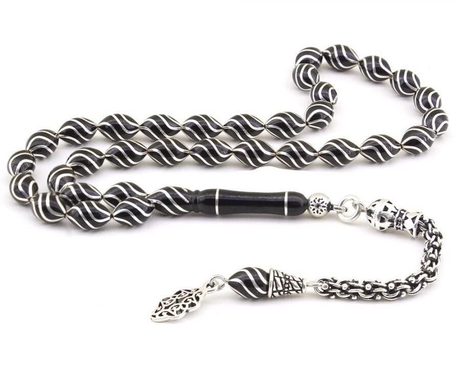 A rosary made of lignite stone engraved with sterling silver - 1