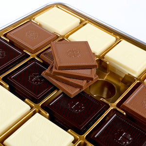 صندوق شوكولاتة برالين 64 قطعة حليب داكن بالصور الشخصية