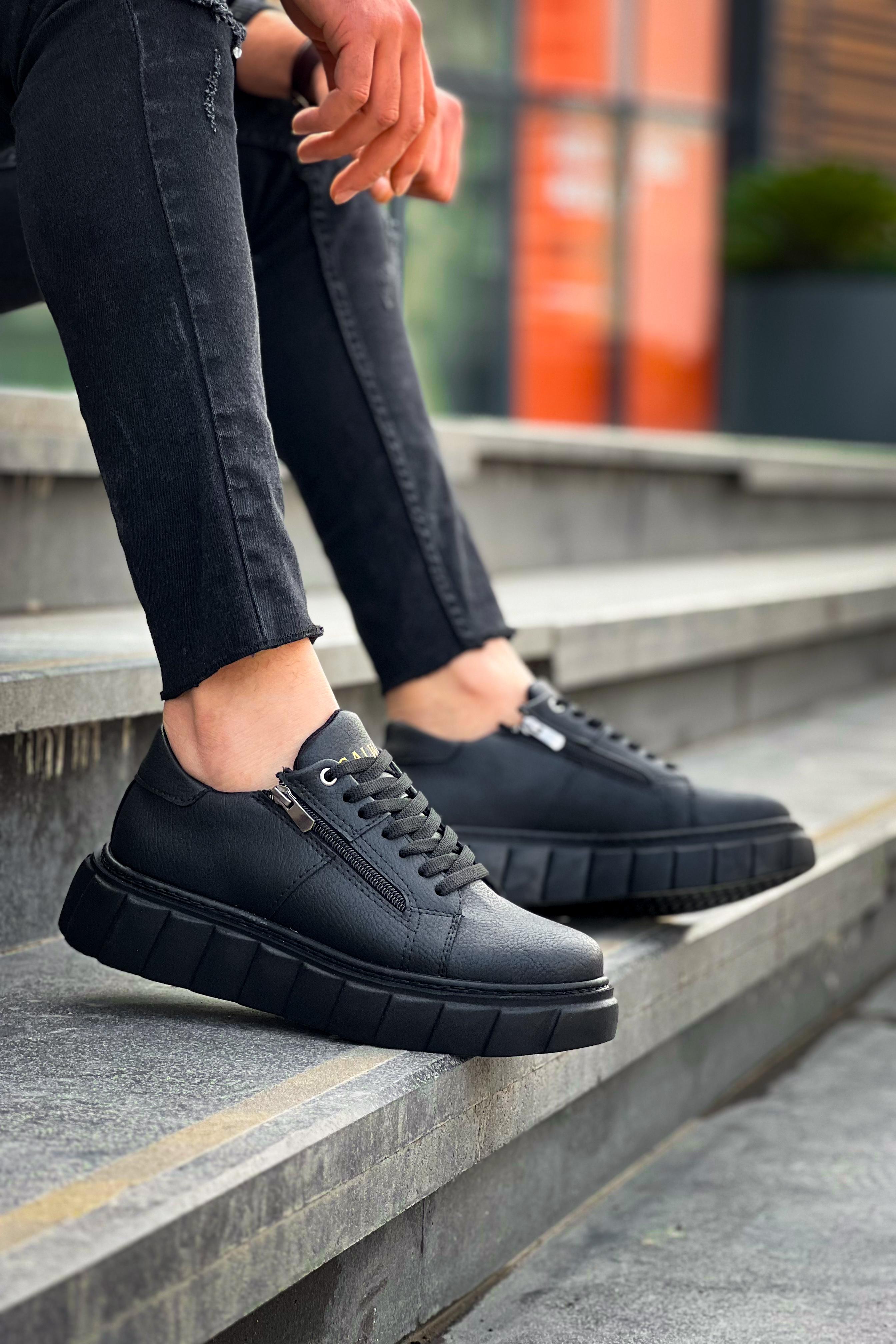 Black High Top Sneakers with Black Leather Detailing