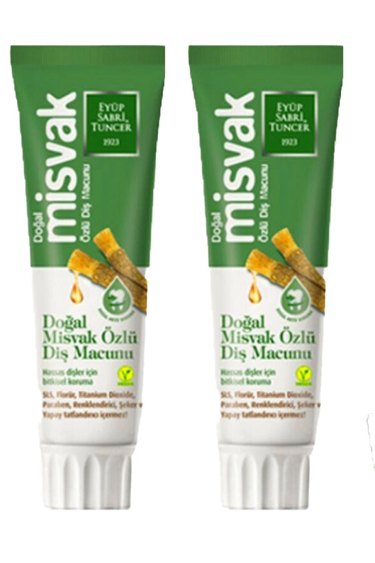 معجون أسنان طبيعي بالمسواك: العناية باللثة والتبييض