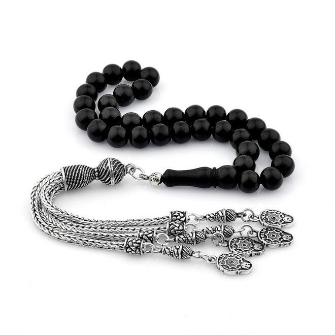Lignite rosary decorated with a silver tassel  bearing police symbols