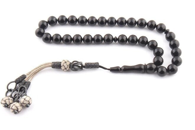 Rrosary made of lignite stone with a silver tassel