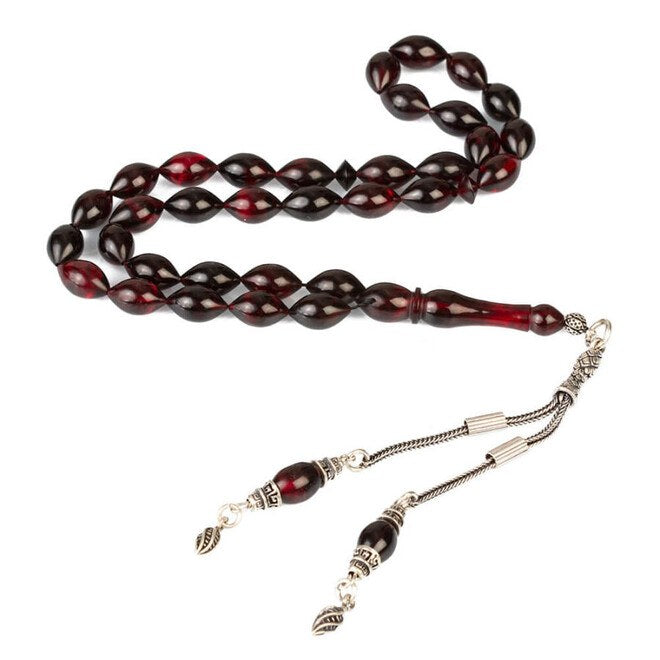 Rosary made of pressed amber with a double silver tassel