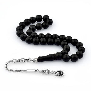 rosary made of lignite stone decorated with a Grey wolf symbol