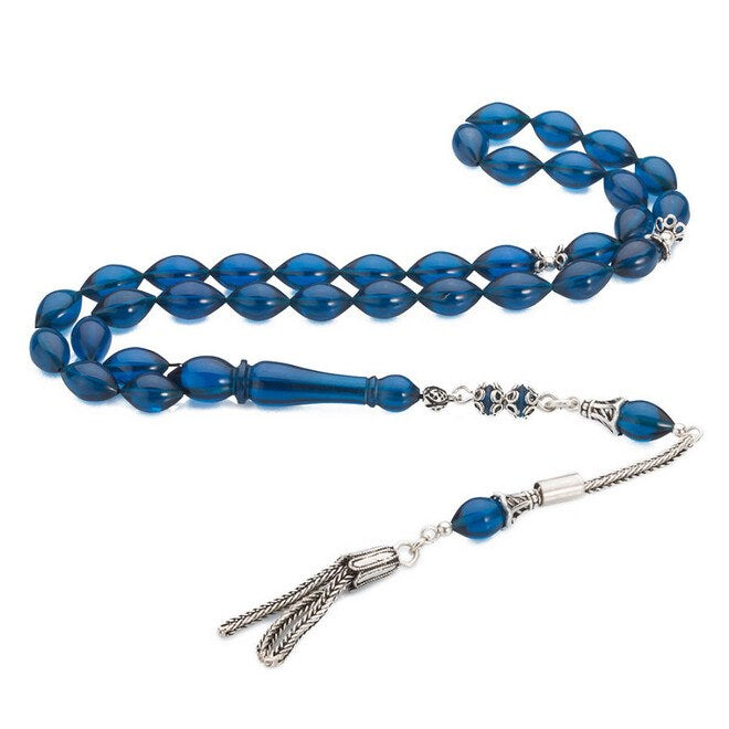 Rosary made of pressed amber with small blue beads