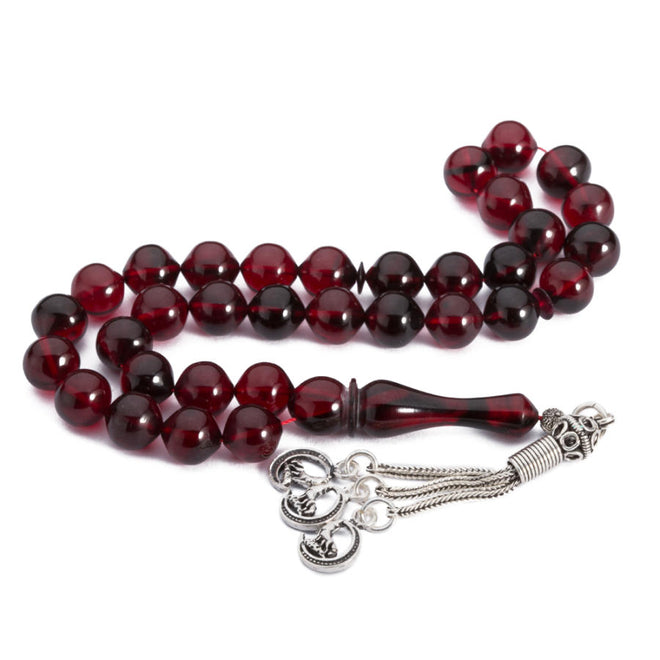 Rosary made of pressed amber with dark red beads