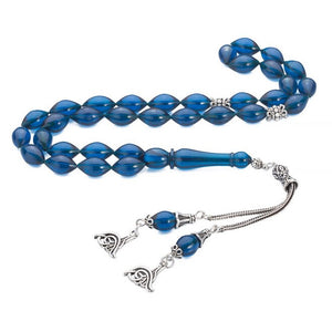Rosary made of pressed amber with blue beads