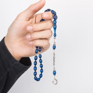 Rosary made of pressed amber with royal moon star decorated tassel