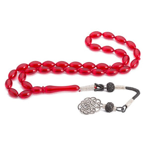 Rosary made of pressed amber with red colored beads
