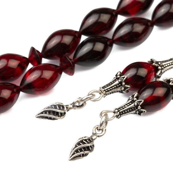 Rosary made of pressed amber in a black-burgundy color