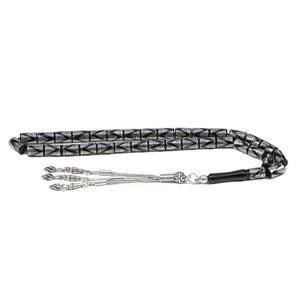 Rosary made of lignite stone with beads engraved in a pyramidal shape
