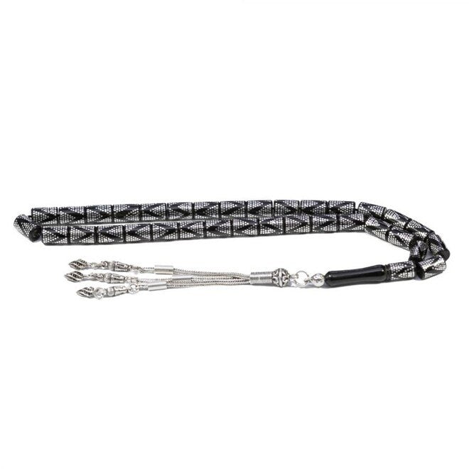 Rosary made of lignite stone with beads engraved in a pyramidal shape