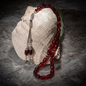 Rosary made of pressed amber with a Ottoman Tughra decorated tassel