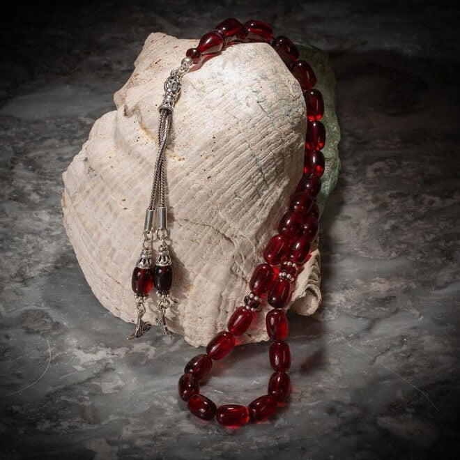 Rosary made of pressed amber with a Ottoman Tughra decorated tassel