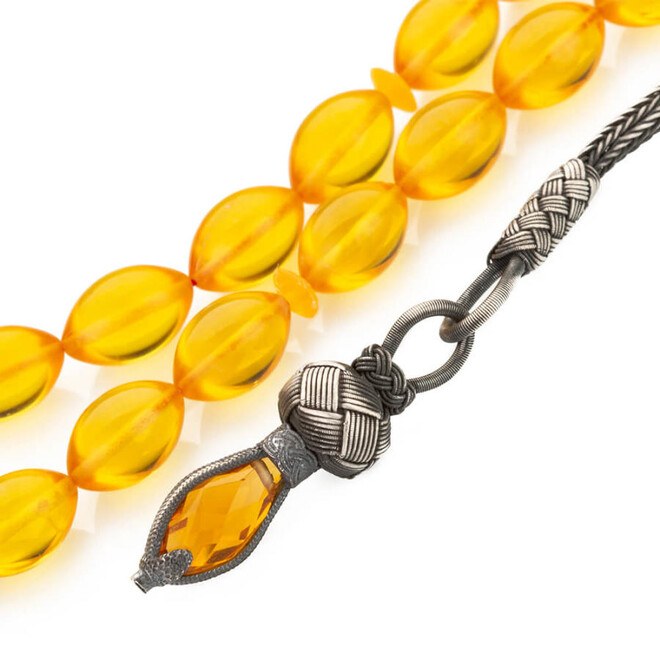Rosary made of pressed amber with a Qazzazia silver tassel