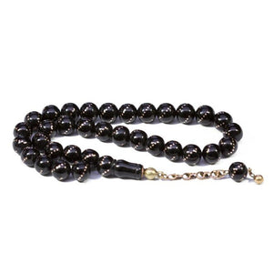 Rosary made of lignite stone engraved with gold