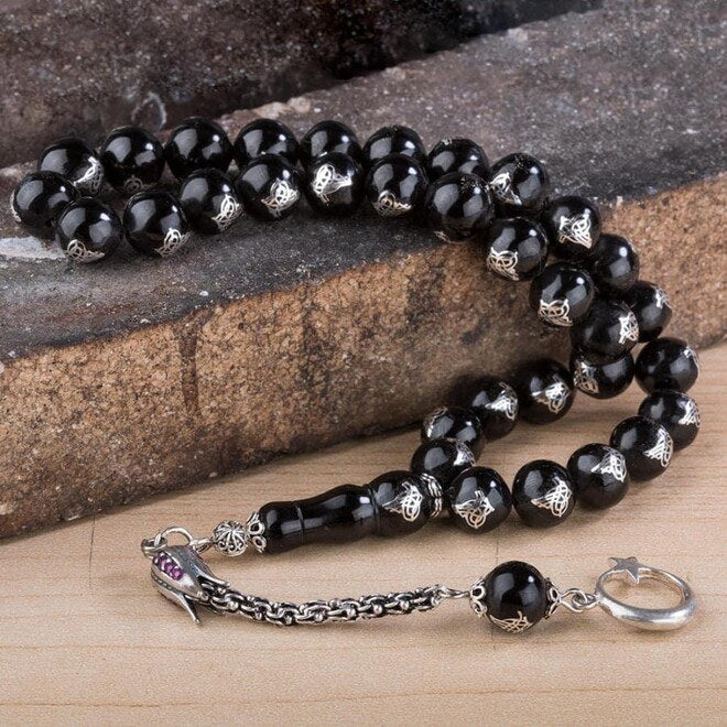 Rosary made of lignite stone decorated with the Tughra symbol