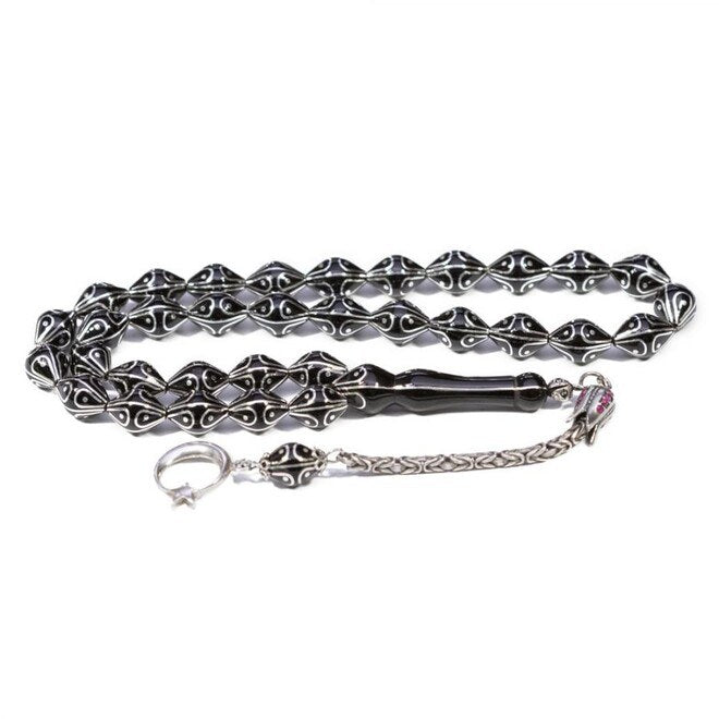 Rosary made of lignite stone decorated with moon star pattern