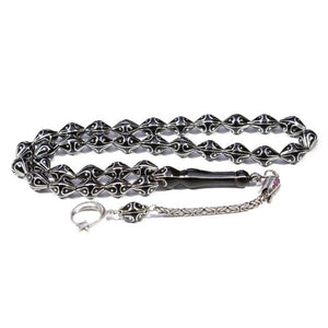 Rosary made of lignite stone decorated with moon star pattern