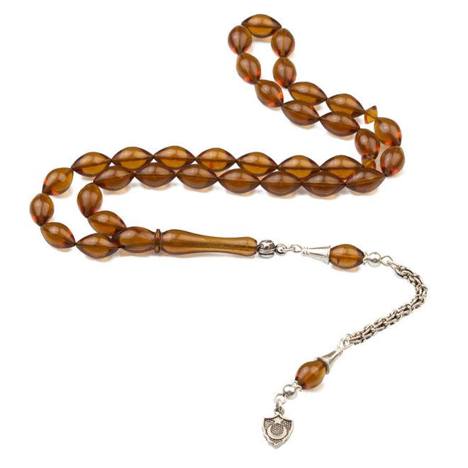 Rosary made of pressed amber with tassel bearing moon star symbol