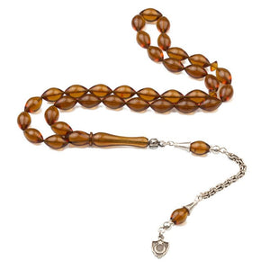 Rosary made of pressed amber with tassel bearing moon star symbol