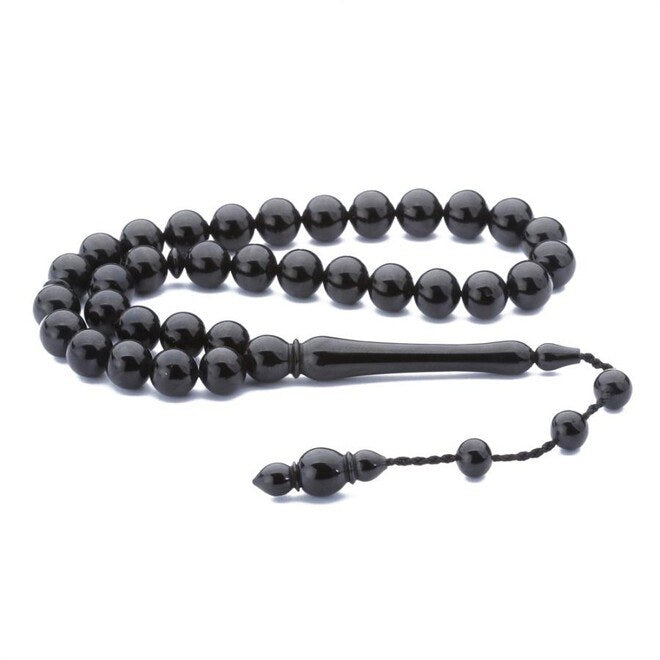 Rosary made of lignite stone with spherical cut beads