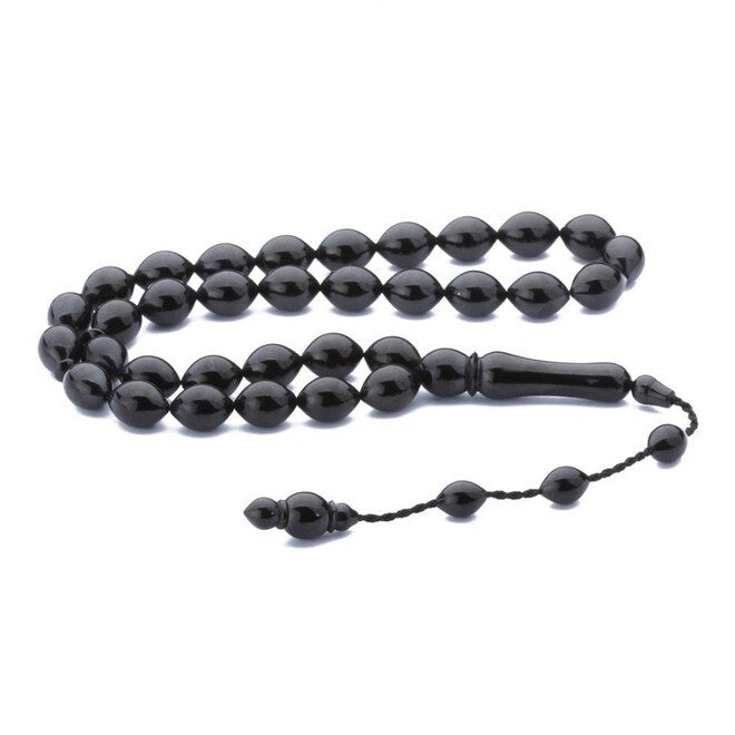 Rosary made of lignite stone with beads cut with pointed ends