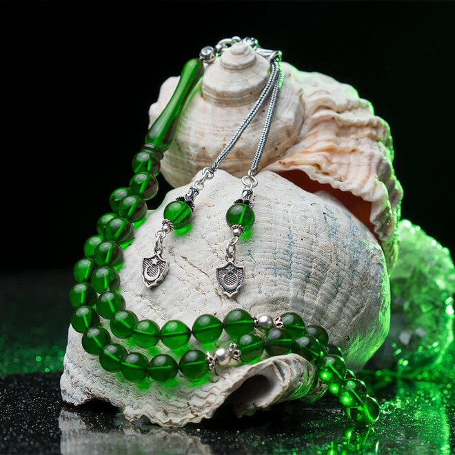 Rosary made of pressed amber with green beads
