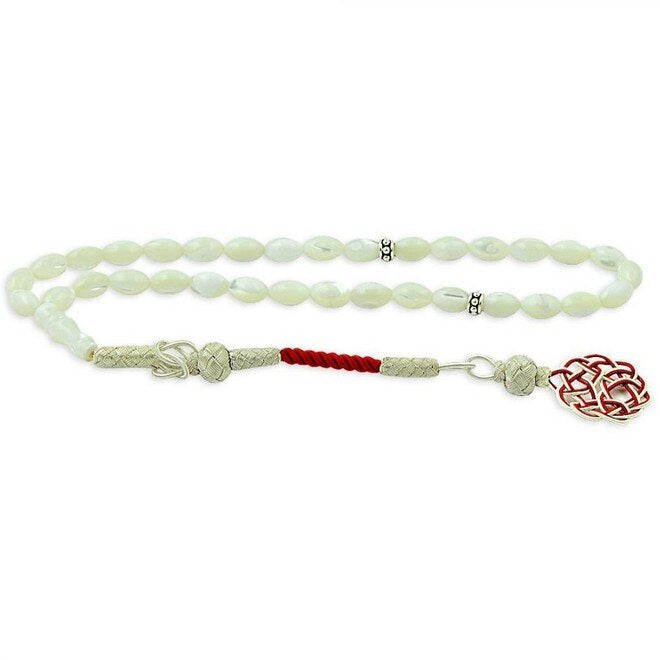 Rosary from mother of pearl stone cut with barley and with a tassel of silver