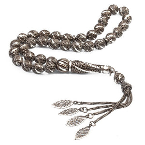 Perforated silver rosary decorated with a silver pen