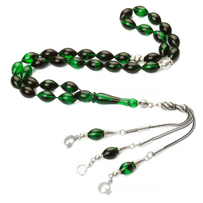 Green rosary made of pressed amber cut with barley wood