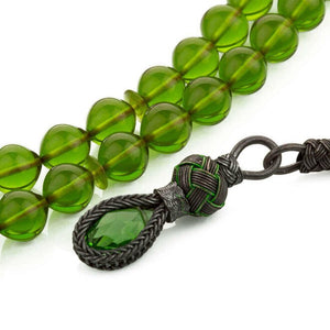 Rosary of green pressed amber with a Qazzazia tassel