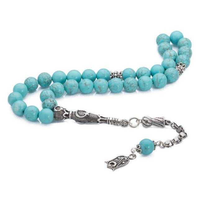 Rosary made of turquoise stone with a tassel decorated with a tulip symbol