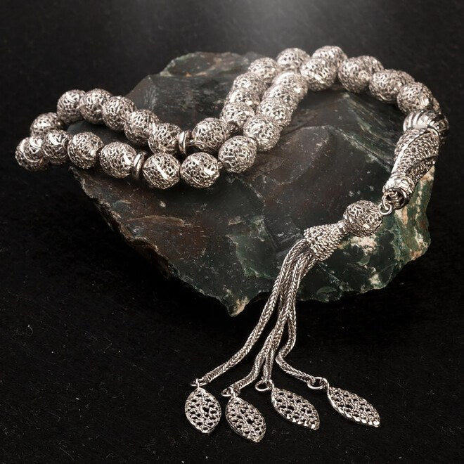 Rosary made of silver perforated by filigree using a silver pen