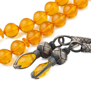 Yellow rosary made of pressed amber with a double tassel