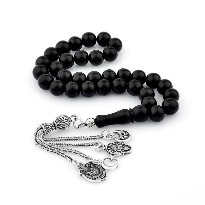 Lignite rosary decorated with mixed motifs silver tassels
