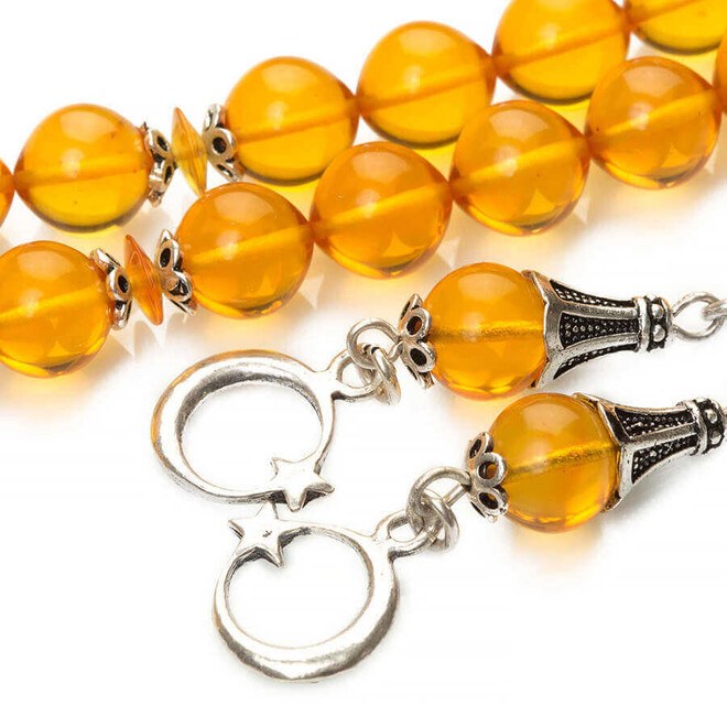 Pressed Amber rosary with yellow beads and a double tassel