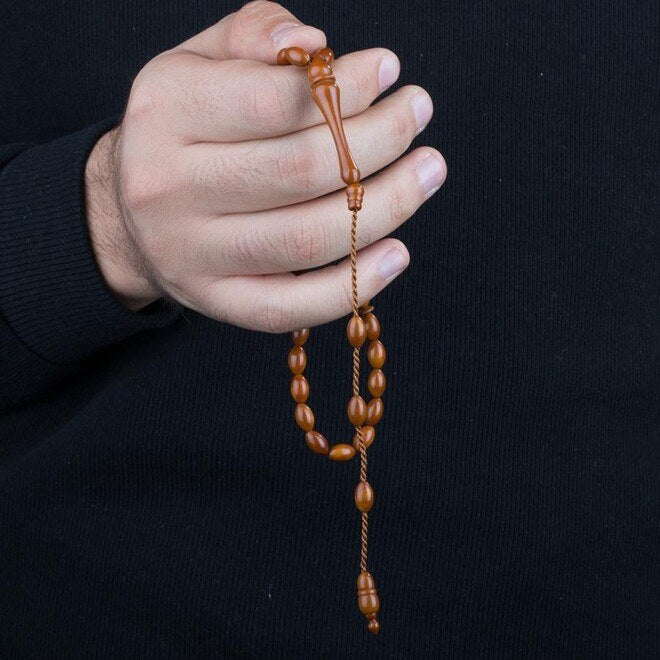 Rosary made of Kuka with brown color