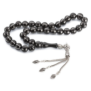 Rosary made of lignite stone embroidered with silver