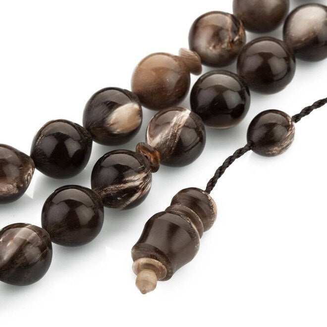 Buffalo horn rosary with a starling cut design