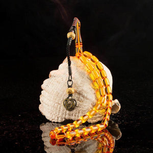 Rosary made of pressed amber with yellow beads