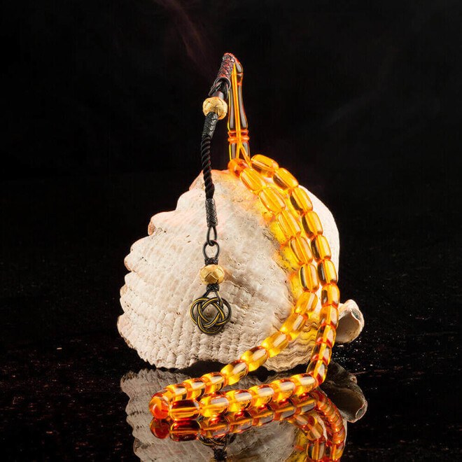 Rosary made of pressed amber with yellow beads
