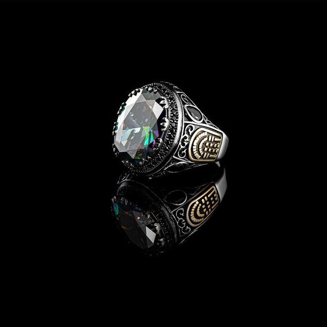 Men's silver ring with a shiny topaz stone