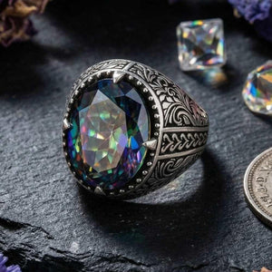 خاتم فضة بيضاوي بزخرفة زهرية وتوباز غامض