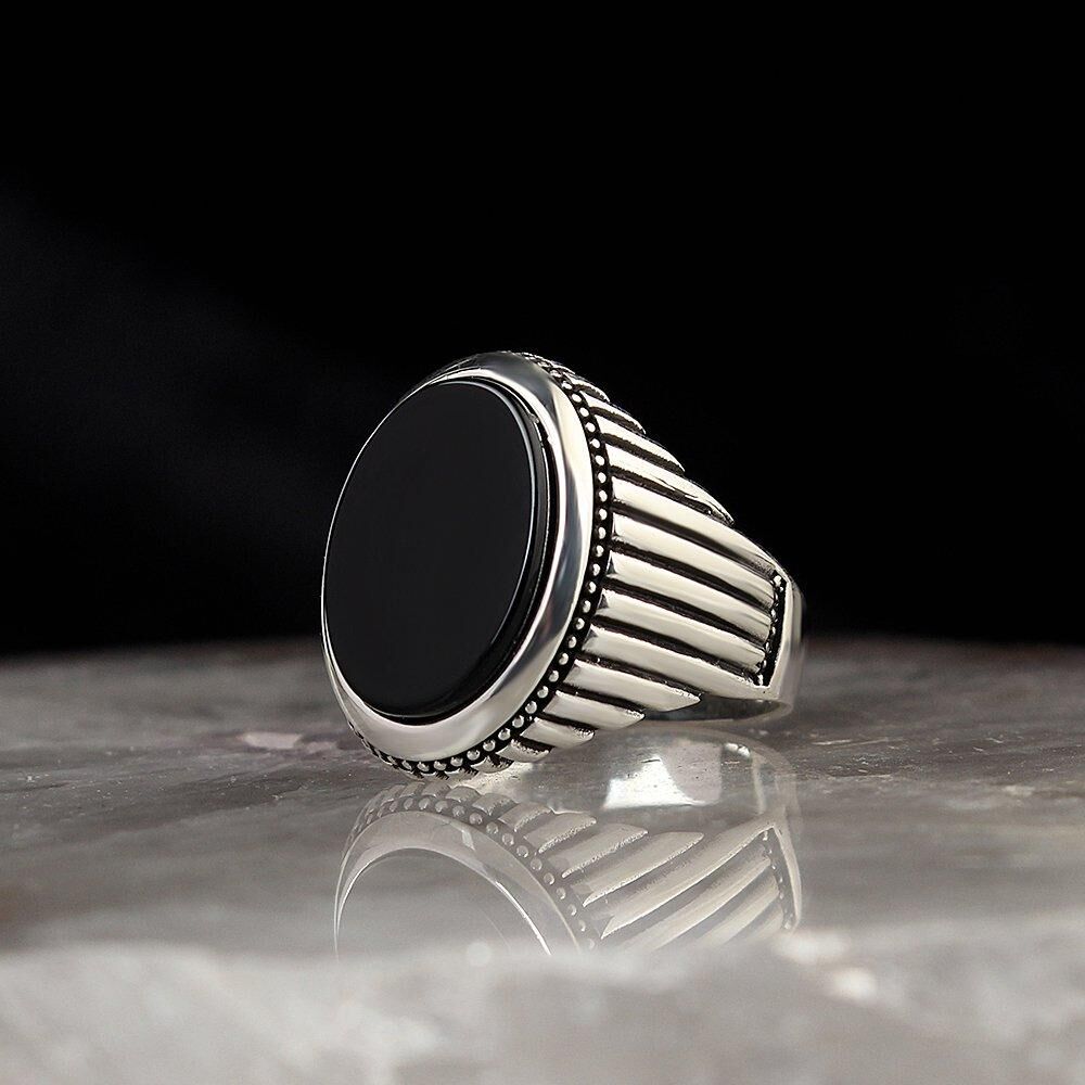 Men's silver ring with onyx gemstone with a circular design - 1