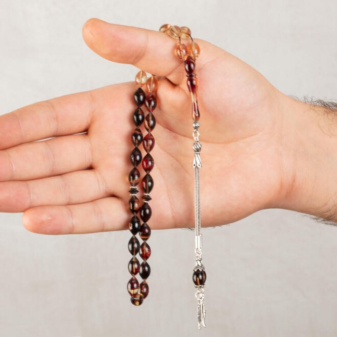 Rosary made of pressed amber with a leaf pattern decorated tassel - 1