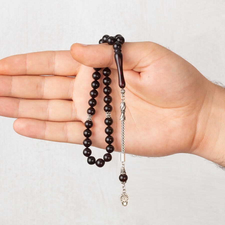 Rosary made of pressed amber with tassel decorated with a police symbol - 1